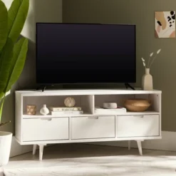 Cara Mid-Century Modern 3 Drawer Corner TV Stand For TVs Up To 58" - Saracina Home 24 Cara Mid-Century Modern 3 Drawer Corner TV Stand For TVs Up To 58" - Saracina Home -Featured Furniture Stores GUEST b1ff3a9a 60ef 41ec 9a6f f1ca309dd560